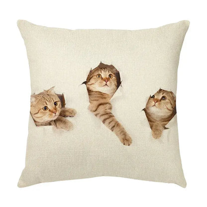 Beige linen throw pillow with cute cat face design of three tabby cats peeking through torn paper holes