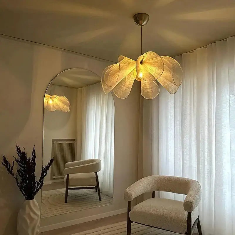 A warm golden fabric flower chandelier with woven petal design in cream fabric for dining room pendant light