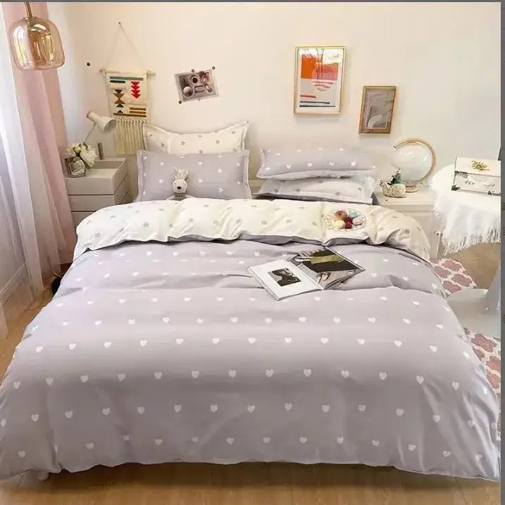 A soft lavender duvet cover with white heart pattern in a cream floral decorbites cartoon printed bedding set