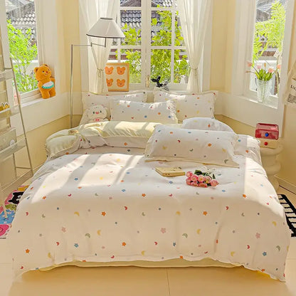 Cream floral decorbites cartoon printed bedding set with white fabric and multicolored stars and moons for bedroom decor