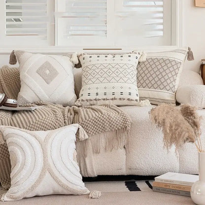 Cream pillow cover with geometric embroidered crocheted design and tassel accents for living room decorbites decor
