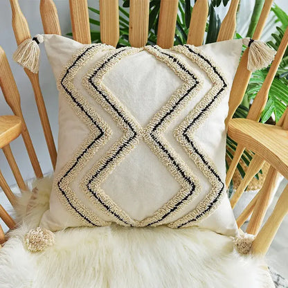 Cream-colored cushion cover with black and beige geometric embroidery and textured tassels for living room decorbites geometric embroidery