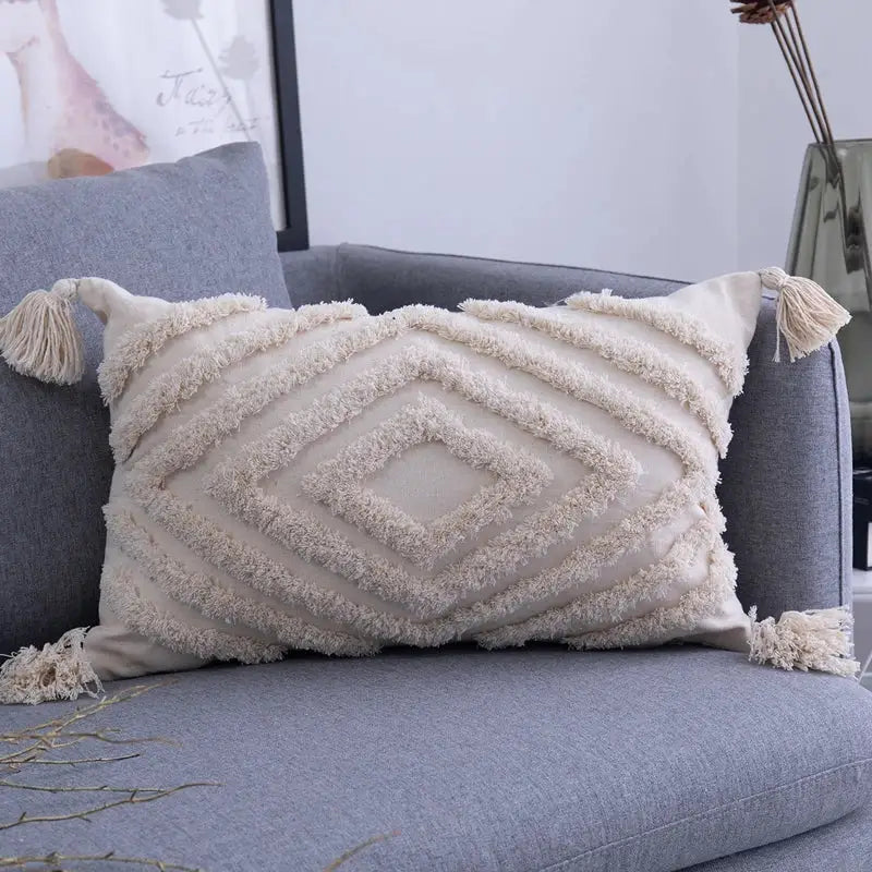 Cream cushion cover with geometric embroidery texture and tassels ideal for living room decorbites decor