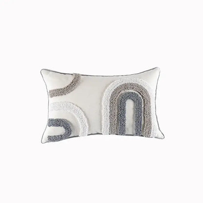 Cream cushion cover with geometric embroidery featuring a textured gray and white rainbow design by decorbites geometric embroidery