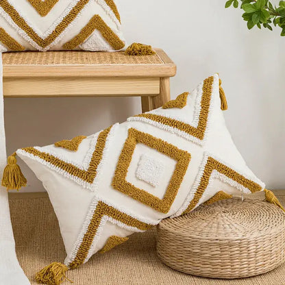 Cream and mustard-yellow cushion cover with geometric embroidery and textured tassels for living room decorbites geometric embroidery