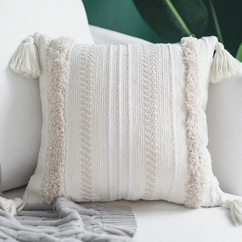Cream cushion cover with geometric embroidery textured vertical stripes and tassels for living room decorbites