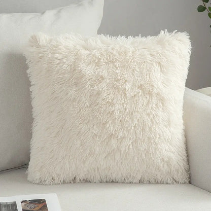 Cream-colored plush faux fur cushion cover with soft shaggy texture and geometric embroidery for living room decorbites