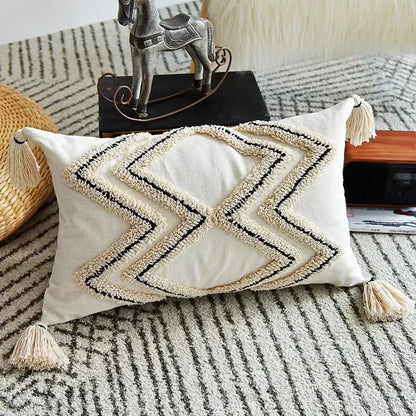 Cream cushion cover with black and cream decorbites geometric embroidery and tassels for living room decor