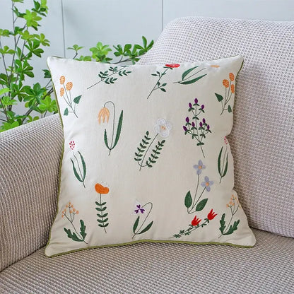 Cream green tulip embroidery cushion cover with cream base and intricate orange purple red floral decorbites green tulip