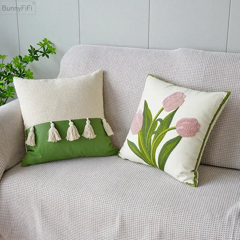 Cream green tulip embroidery cushion cover with pink tulip embroidery and tassels from decorbites green tulip decor