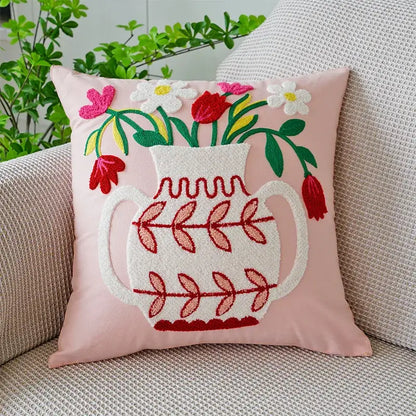 Pink cushion with white embroidered vase and red leaf patterns featuring decorbites green tulip embroidery decorbites green
