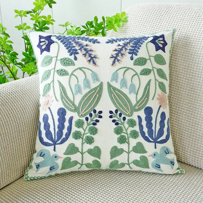Cream green tulip embroidery cushion cover with intricate blue green floral and bird decorbites green tulip design