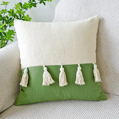 Cream and olive green two-tone woven pillow with five cream tassels featuring decorbites green tulip embroidery design