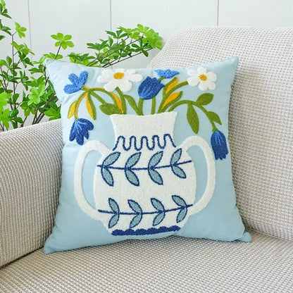 Cream green tulip embroidery cushion cover with light blue fabric featuring decorbites green tulip floral design