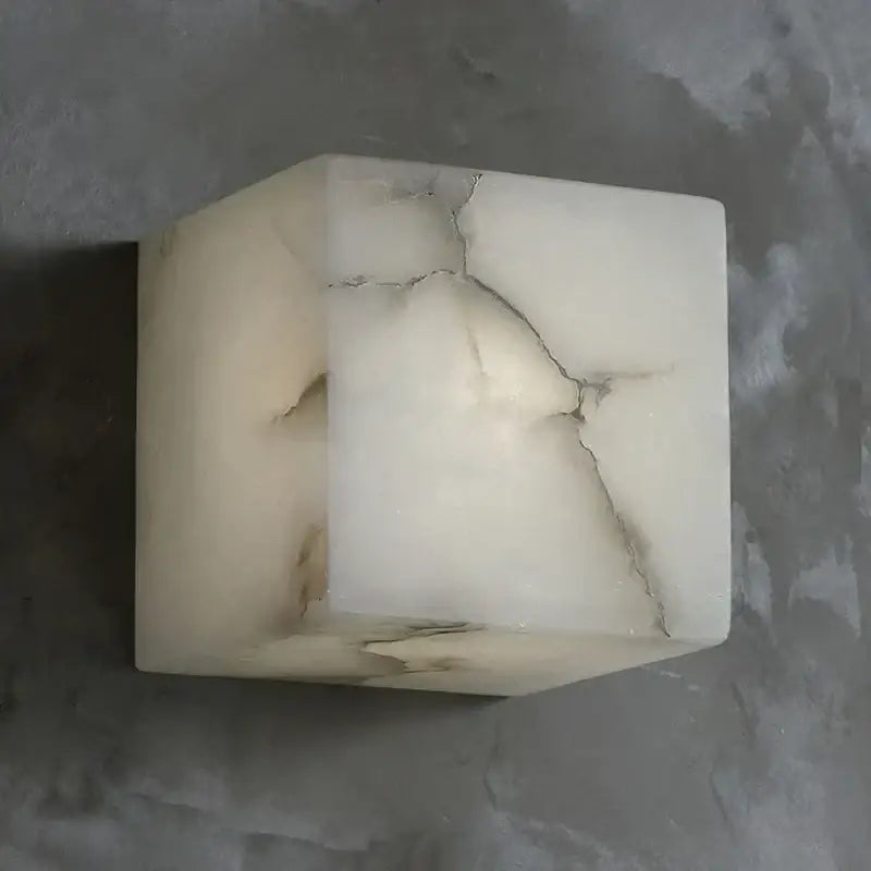 Cream onyx marble cube led wall sconce with natural veining and subtle cracks for bedroom lighting