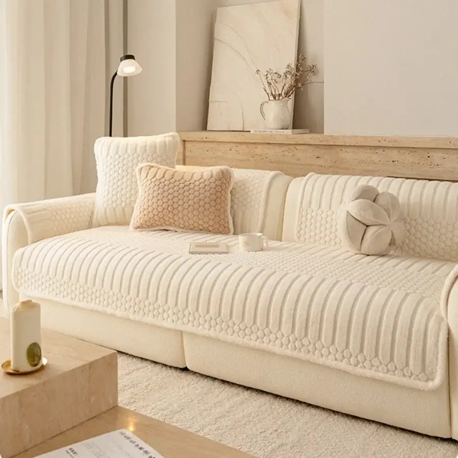 Cream plush loop yarn jacquard knit sofa slipcover with vertical ribbed and diamond-patterned stitching for living room use