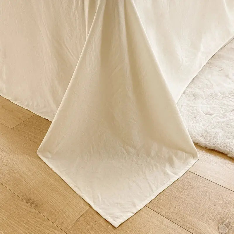 Cream ribbed bubble yarn duvet cover set with cream-colored softly draped textured fabric for bedroom bedding