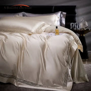 Cream-colored satin bedding set with elegant silver lace trim made from decorbites damask lyocell cotton for bedroom decor
