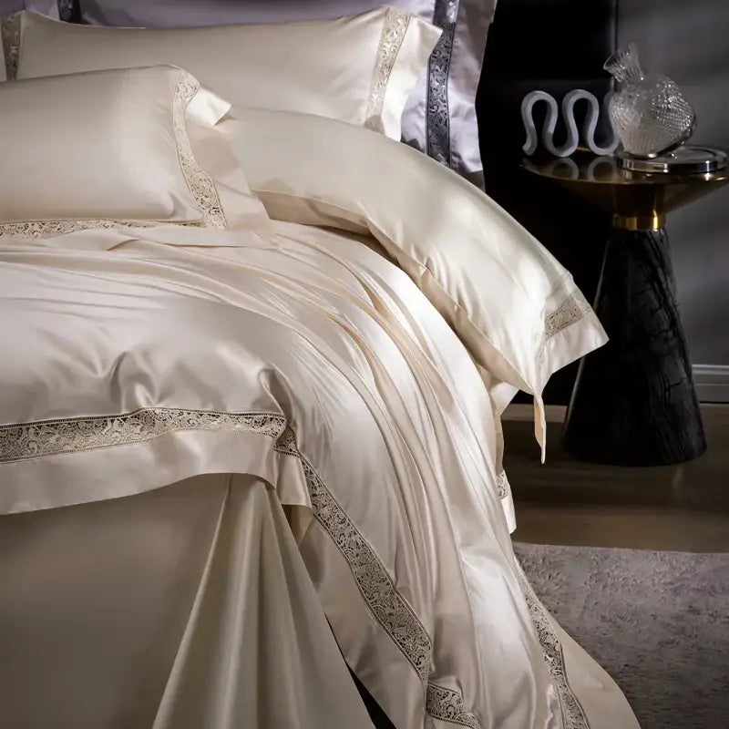 Cream-colored satin bedding set with delicate lace trim in decorbites damask lyocell cotton for elegant bedroom decor