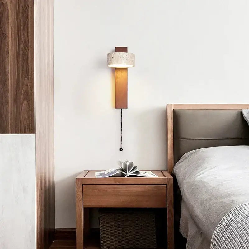 Warm-toned wooden decorbites cream style bedside lamp with off-white cylindrical shade and sleek walnut panel