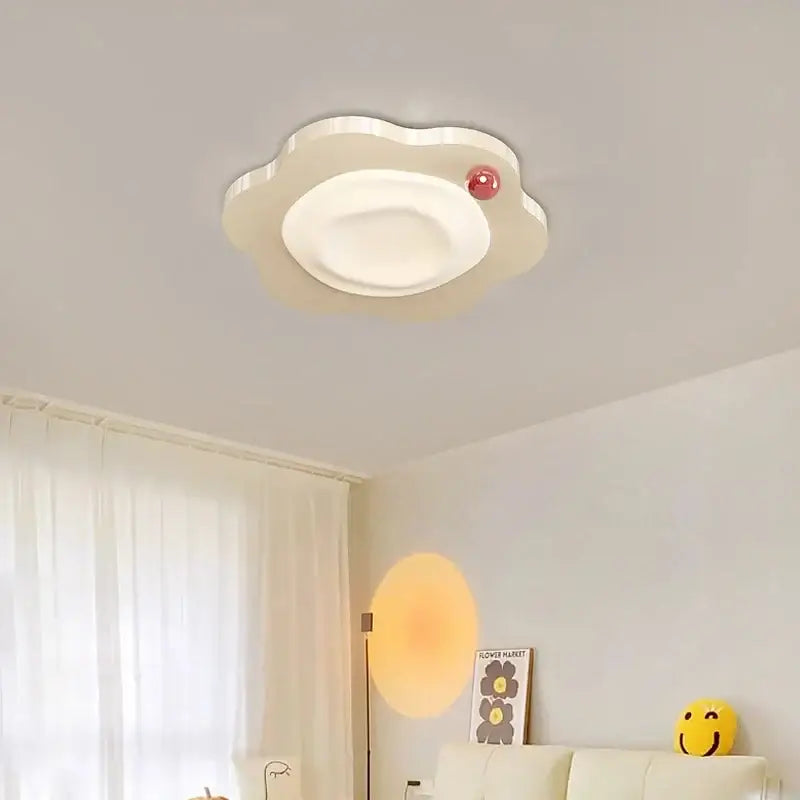 Cream style beige cloud LED ceiling light with a white cloud shape and red spherical accent for bedroom decor