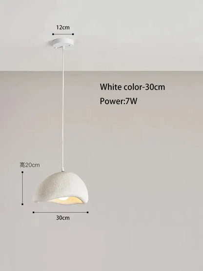 Cream style cloud pendant lamp with white ceramic textured dome shade and sleek white cord for dining room decorbites cream style