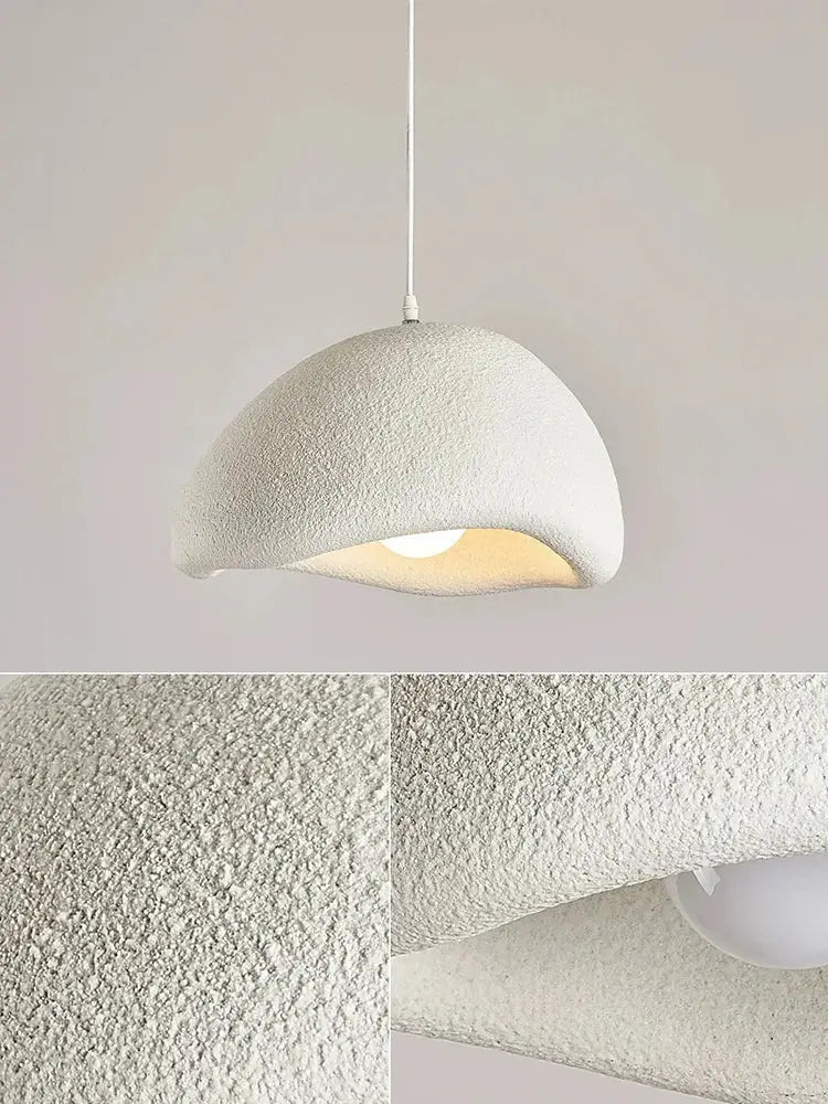 A modern cream style cloud pendant lamp with textured matte finish and curved dome shape for dining room decorbites cream style
