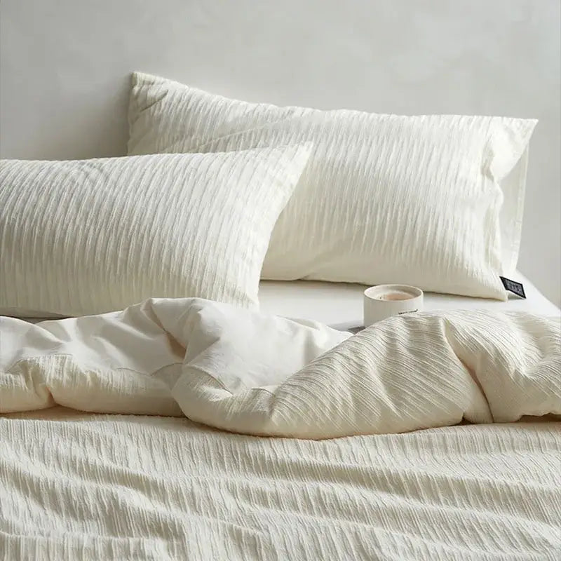 Cream textured cotton foam yarn bedding set with a subtle crinkled pattern for a luxurious bedroom look