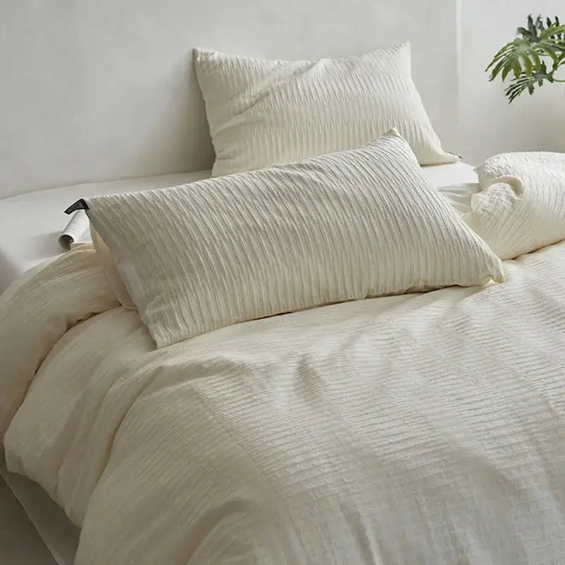 Cream textured cotton foam yarn bedding set with ribbed duvet and soft ribbed cotton pillowcases for bedroom use
