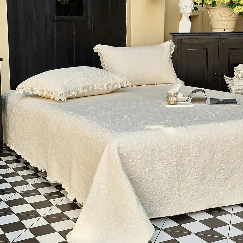 Cream textured cotton quilted bedspread set with delicate lace trim on pillows for elegant bedroom decorbites bedspread set