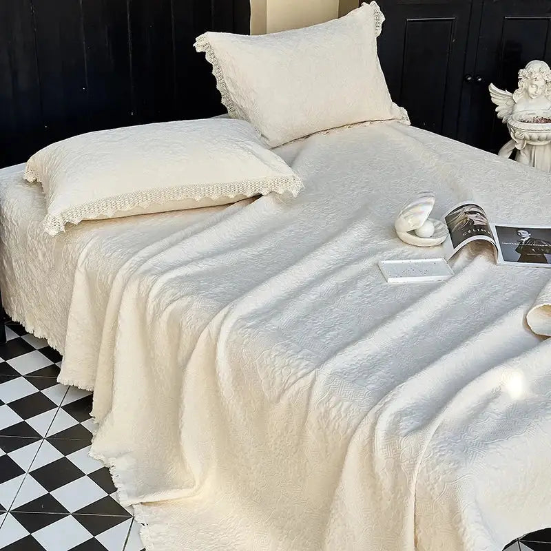 Cream textured cotton quilted bedspread set with delicate lace trim on pillows for elegant bedroom decorbites cotton quilted