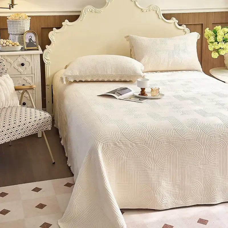 Cream textured cotton quilted bedspread set with a subtle swirling pattern in soft decorbites cotton quilted fabric