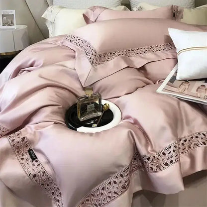 Pink satin bedding set with delicate lace trim made of eucalyptus fiber by decorbites for luxury bedroom decor