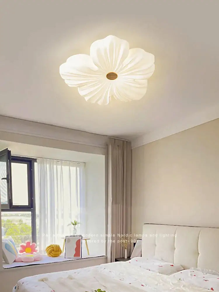 A cream wind flower eye protection ceiling light with white flower-shaped petals and a soft glow for living room decorbites cream wind