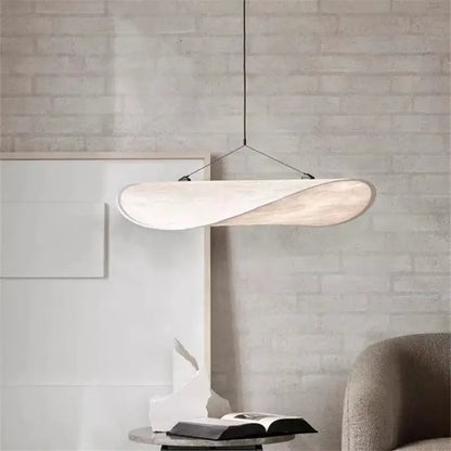Modern white pendant light with a sleek twisted wooden design suspended by black cord for decorbites tense lamp decor