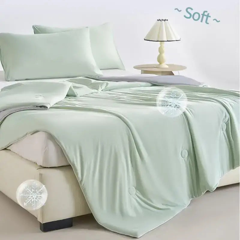 Mint green ice cream silk quilt with satin-like texture and subtle button detailing from decorbites ice cream cream silk quilt collection