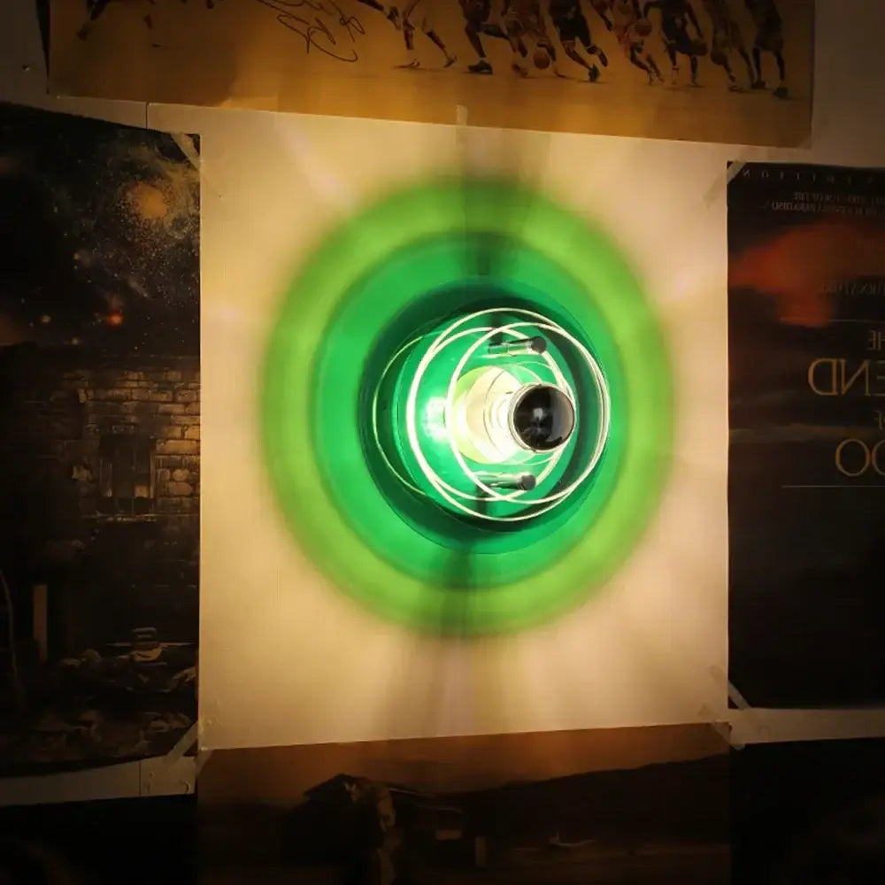 Green glowing creative acrylic wall lamp with concentric rings and central bulb for multi-colored bedroom decor
