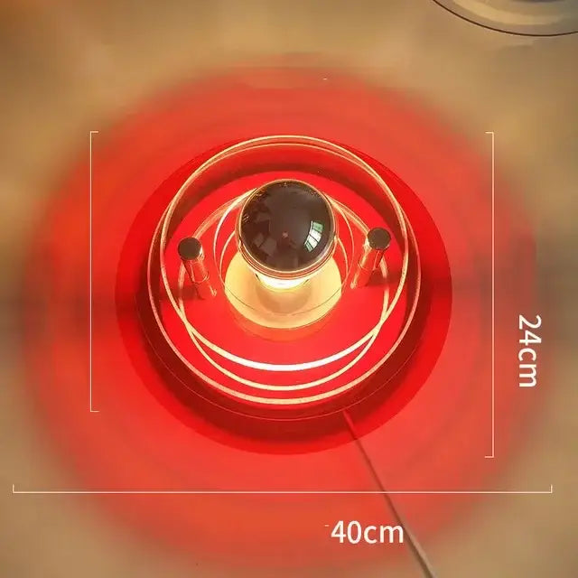 Red circular infrared wall lamp with central bulb encased in metallic rings for decorbites creative acrylic wall decor