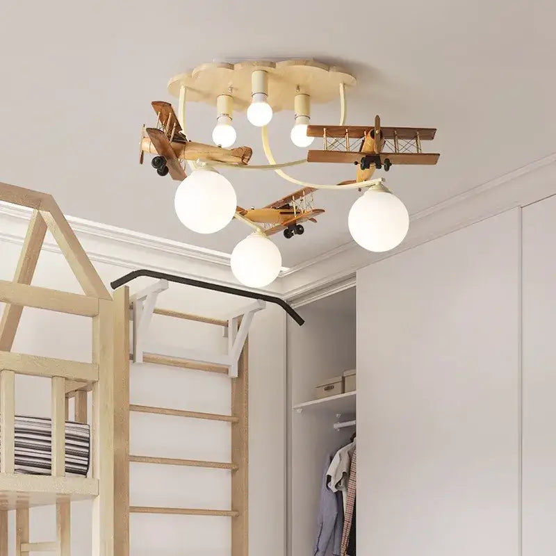 Creative airplane led wooden plane chandelier with three white globe bulbs and two vintage biplanes for boys bedroom