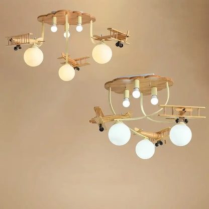 Wooden plane chandelier with airplane led wooden design and spherical frosted glass shades for boys bedroom ceiling light