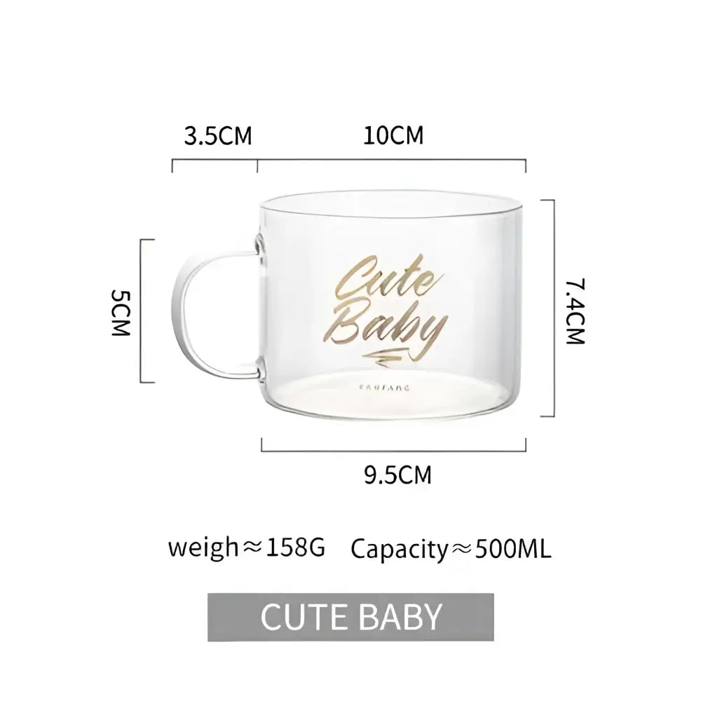 Clear glass mug with gold cursive cute baby inscription and small logo from decorbites creative alphabet glass collection