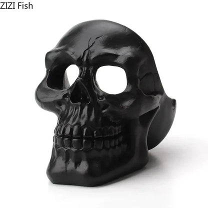 Creative black plastic skull ashtray with glossy finish and detailed facial features for living room smoking gift
