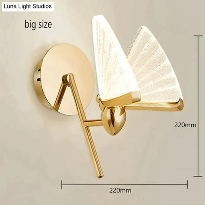 Gold-finished creative colorful butterfly led wall lamp with two translucent fan-shaped glass shades for bedroom use