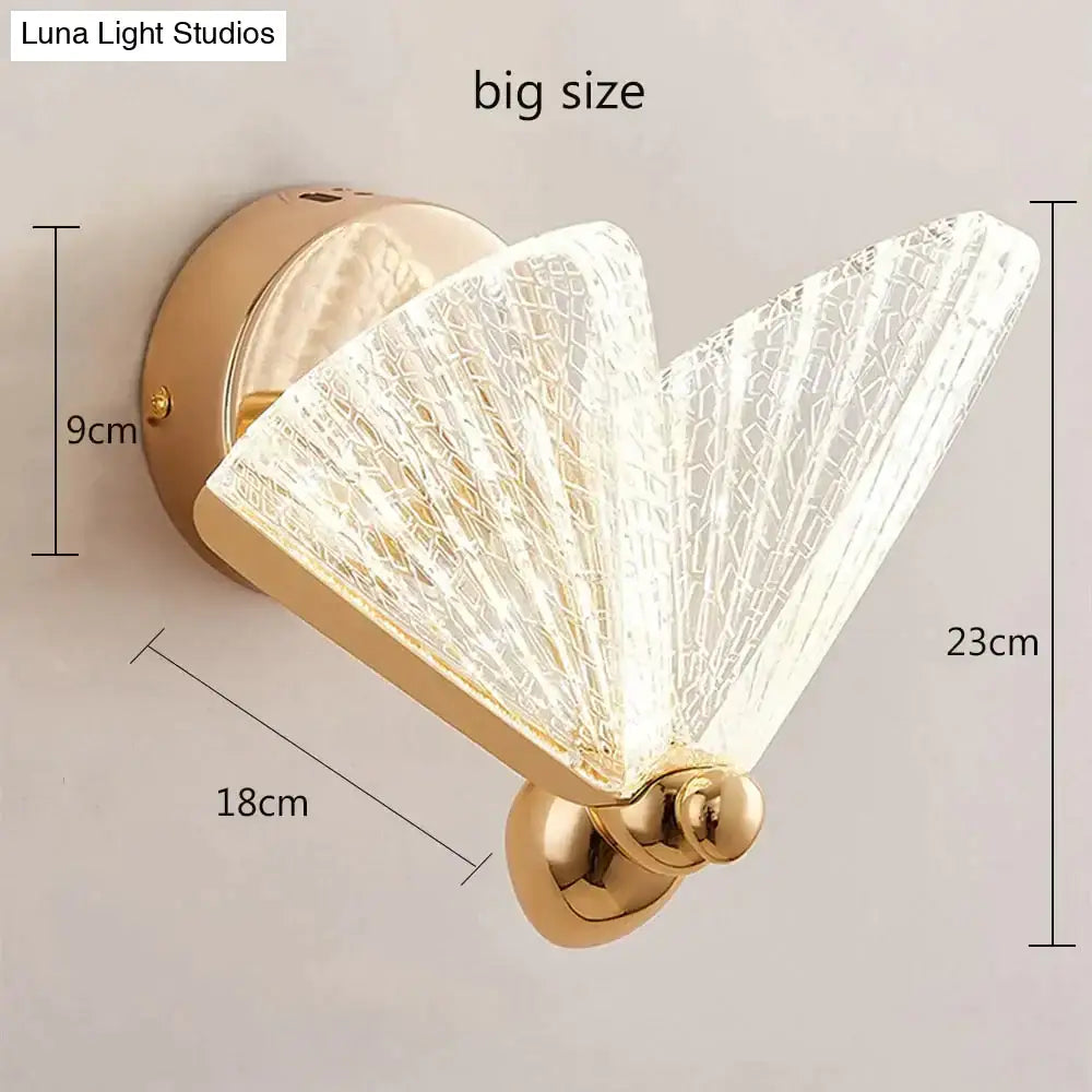 Gold finished wall sconce with translucent textured glass fan shaped diffuser for creative colorful butterfly led lamp