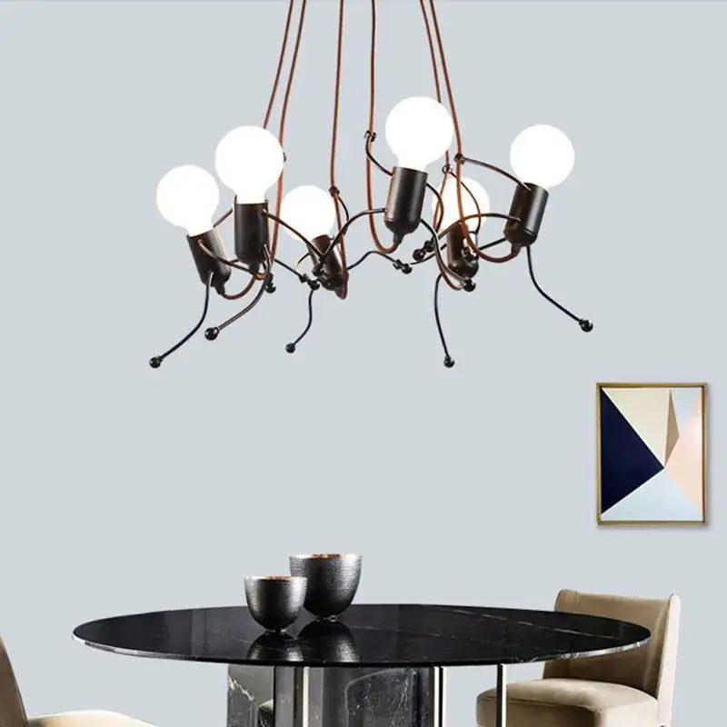Black metal iron man chandelier with articulated limbs and exposed bulb sockets by decorbites iron for bedroom decor