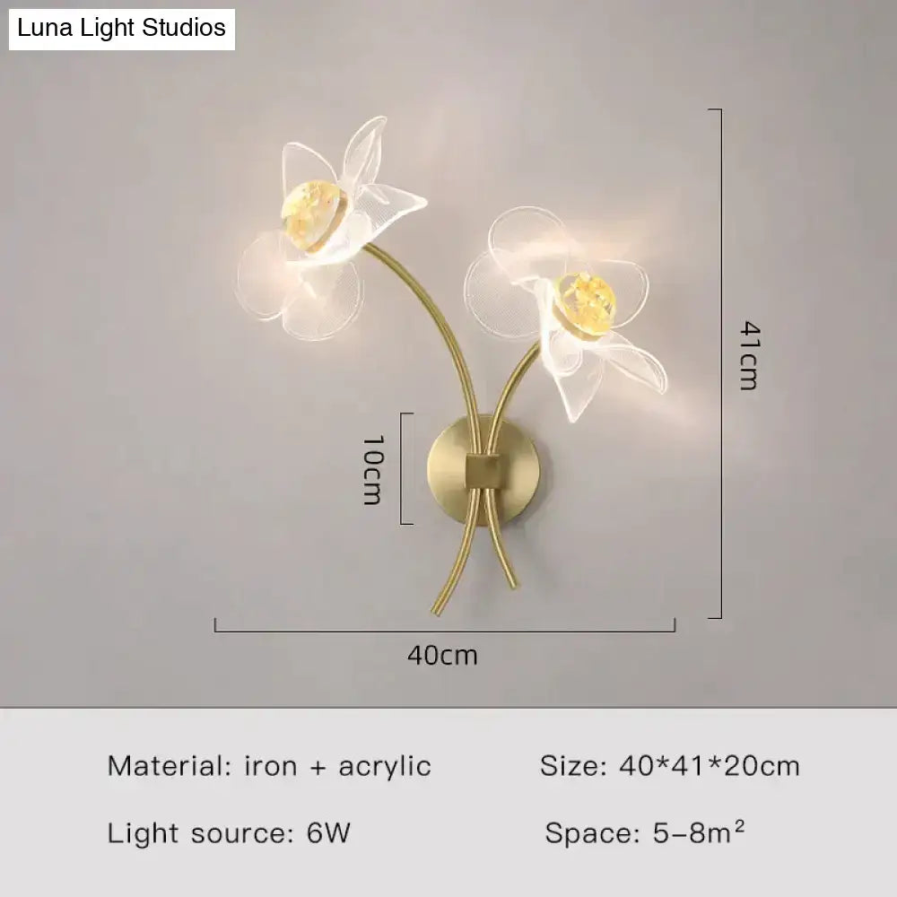 Creative floral decorative gold led wall lamp with two translucent acrylic flowers and golden crystal centers in iron