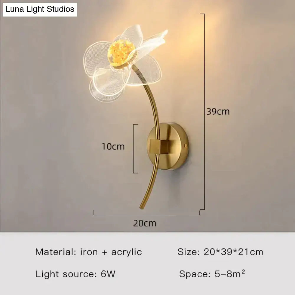 Creative floral decorative gold led wall lamp shaped like a flower with acrylic petals and iron frame for bedroom use