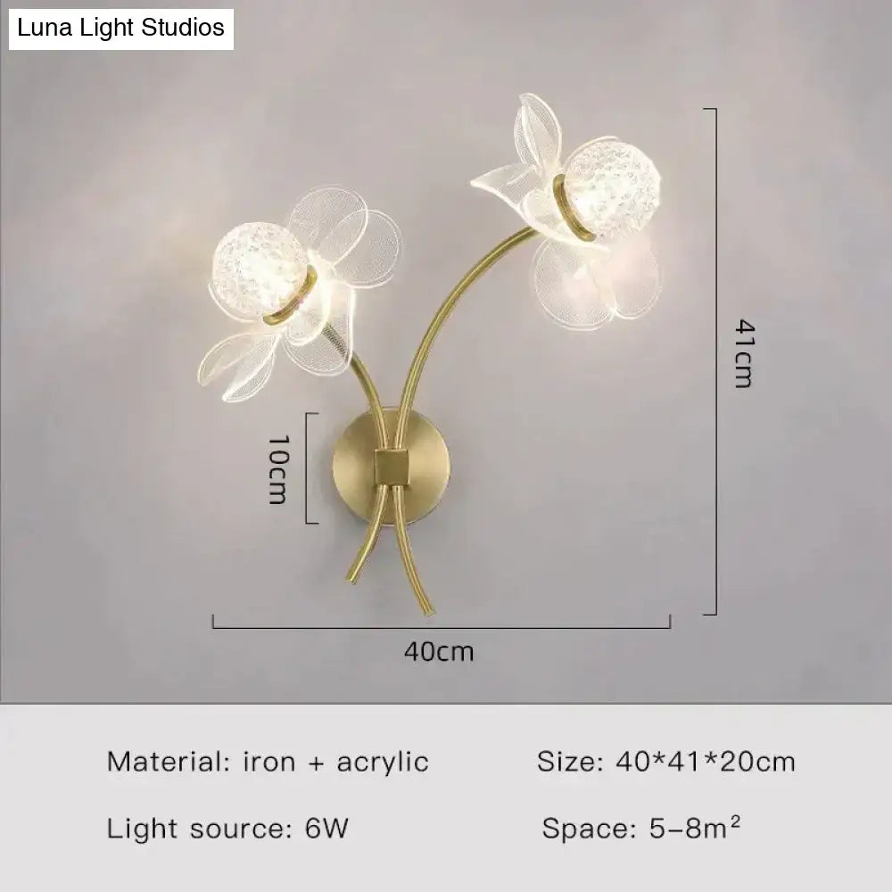 Creative floral decorative gold led wall lamp with translucent acrylic flower-shaped lights and iron base for bedroom