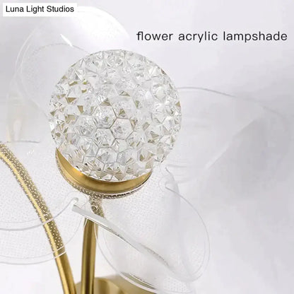 Creative floral decorative gold led wall lamp with clear faceted acrylic lampshade and gold-toned metallic base