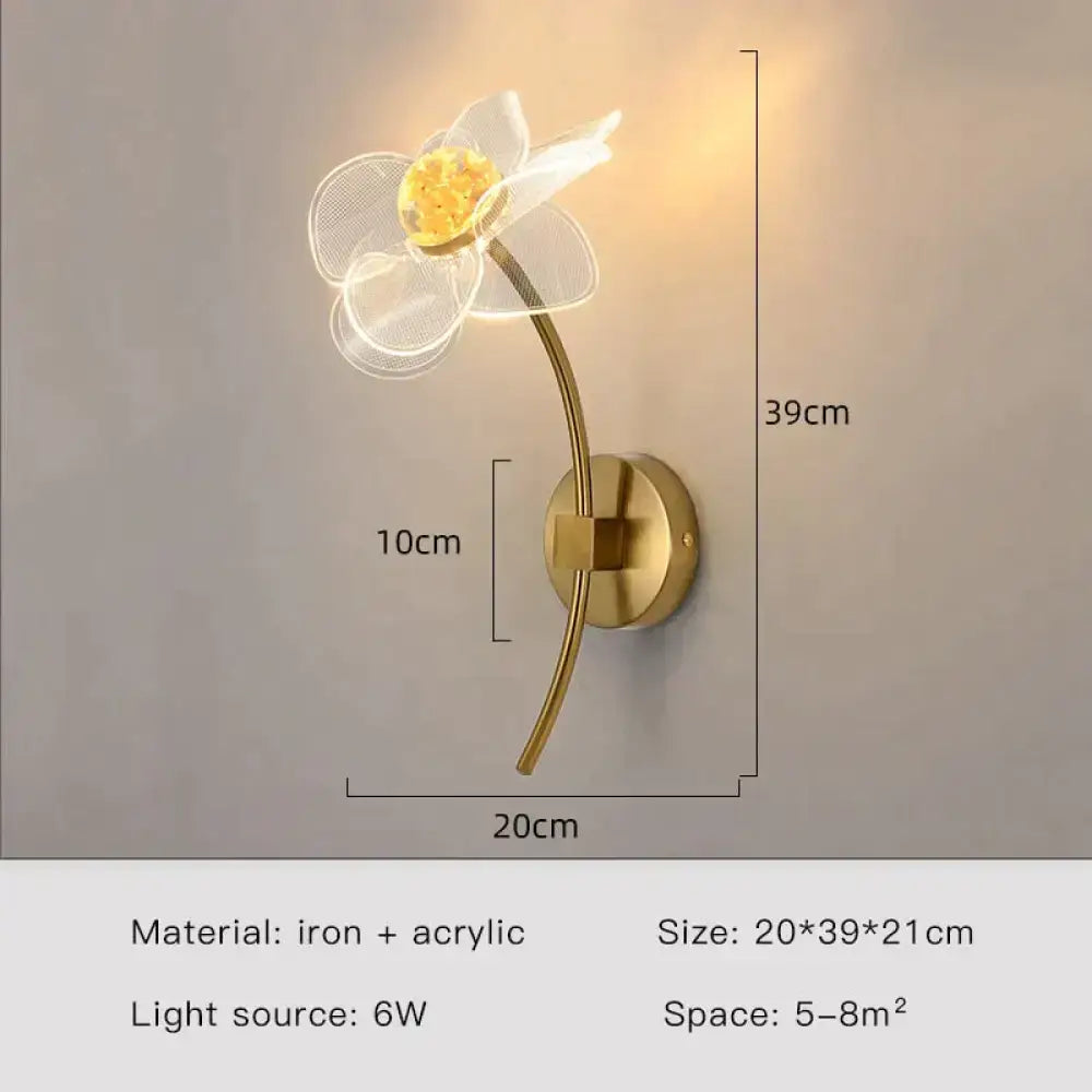 Creative floral decorative gold led wall lamp featuring a translucent flower design in iron and acrylic for bedroom use